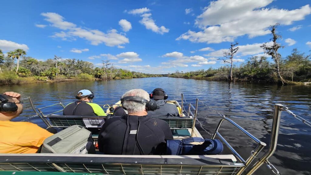 people on boat on river