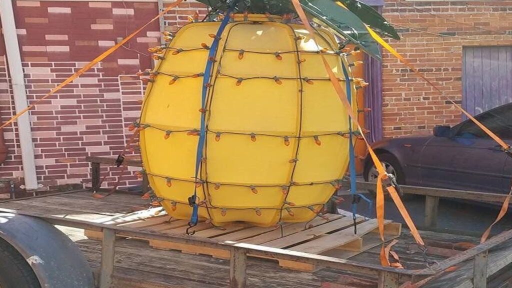 giant pineapple on a cart