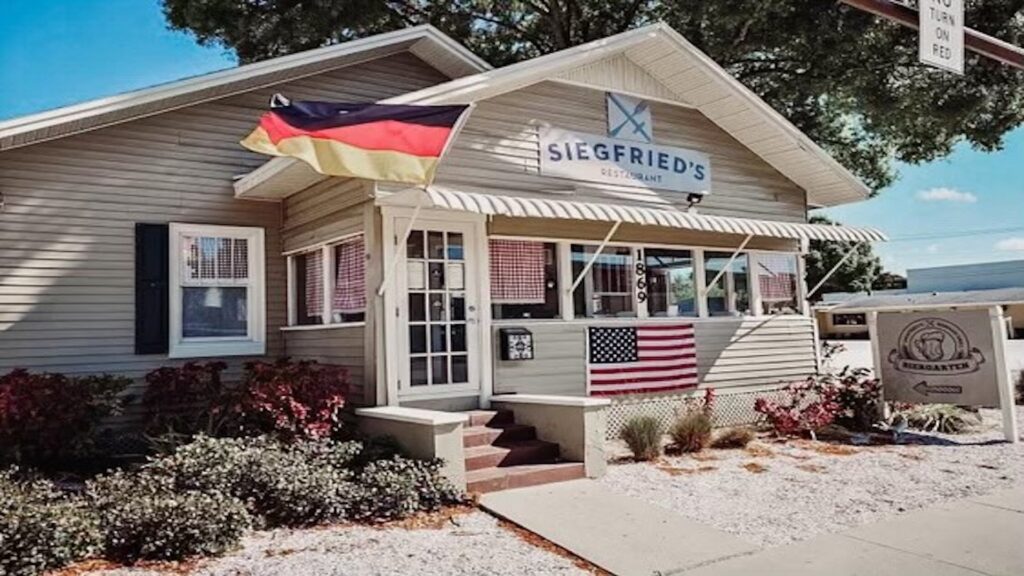 cottage with german flag flying